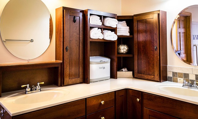 Rustic bathroom cabinets and synthetic counter.  Let Helotes Remodeling Contractors give you the bathroom of your dreams